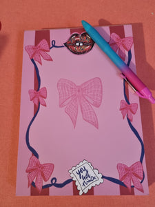 To slay list, bow, lip notepad